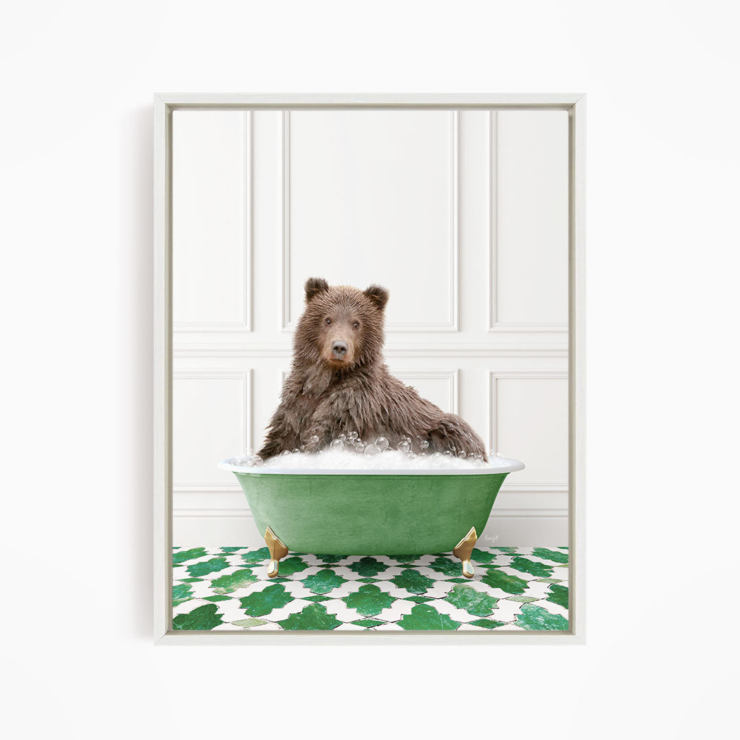 A brown bear sitting in a green bathtub filled with water, surrounded by a green and white patterned floor.