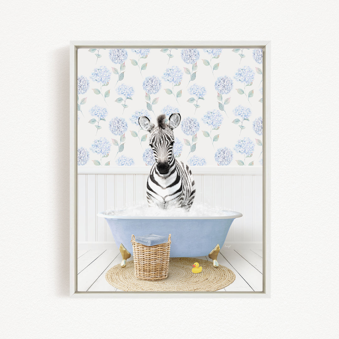 A zebra standing in a blue bathtub filled with water, surrounded by a wicker basket and a yellow rubber duck.