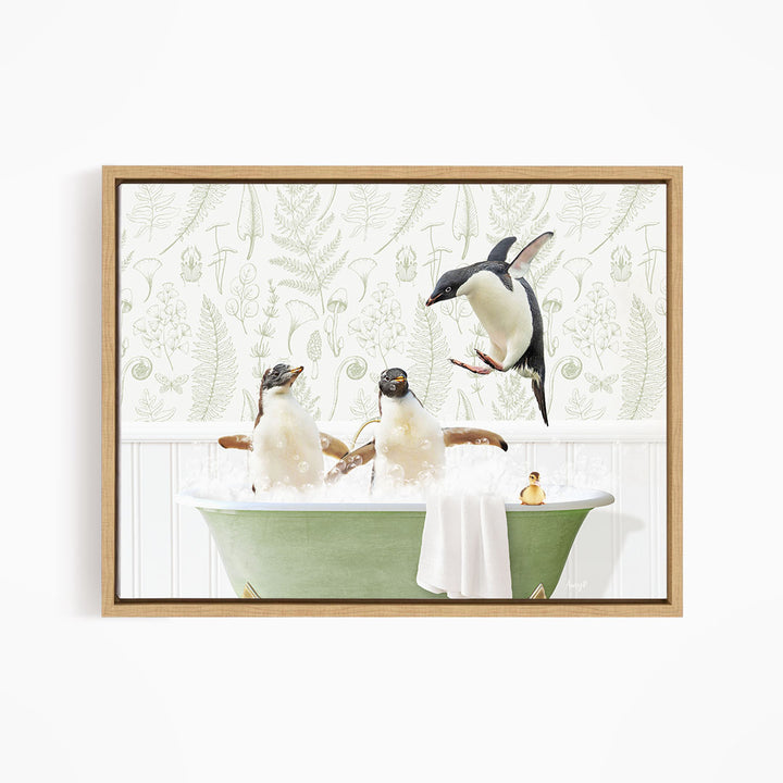 A framed image depicting three penguins sitting in a green bathtub, with one penguin flying towards the tub.