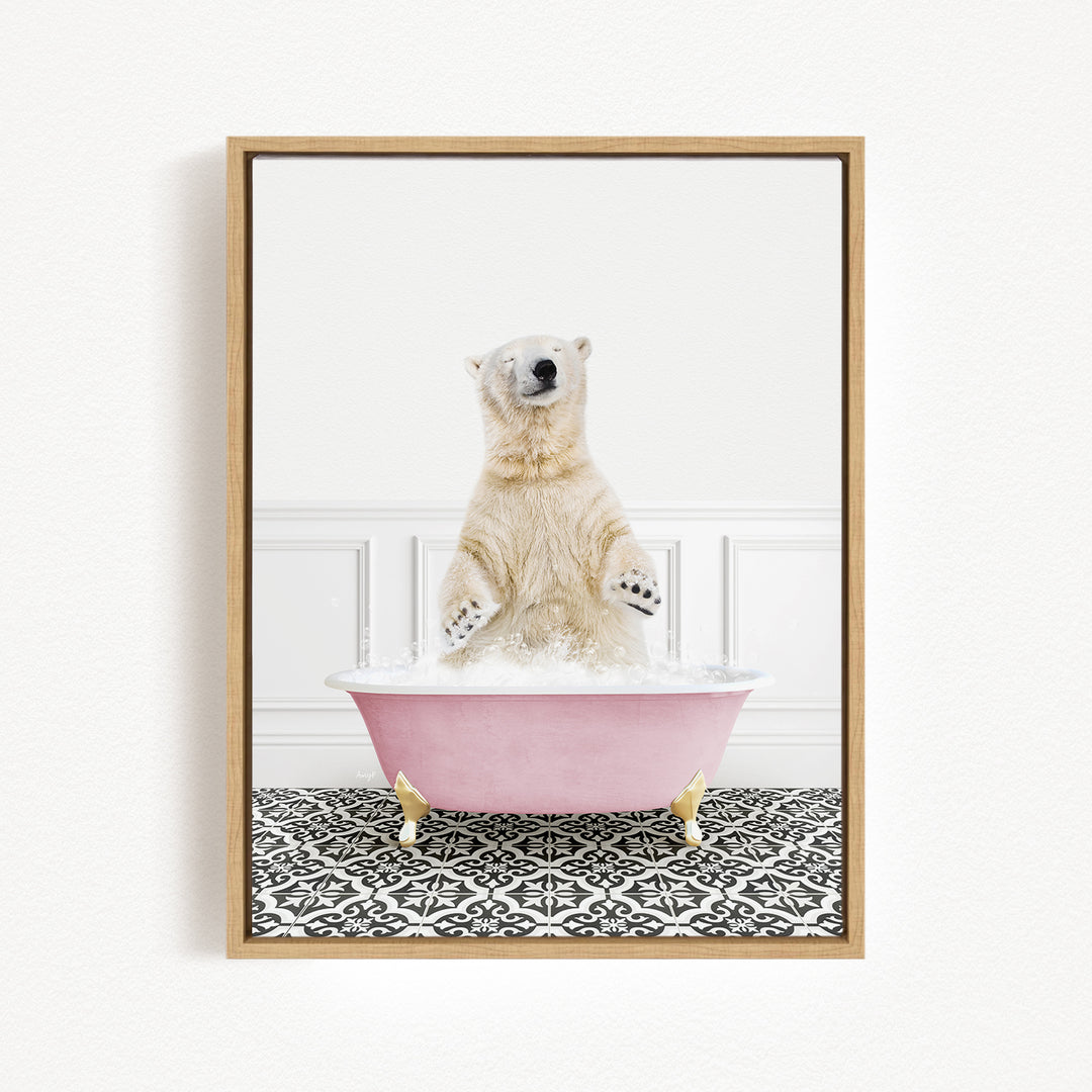 A polar bear standing in a pink bathtub filled with water, with its paws raised in the air.