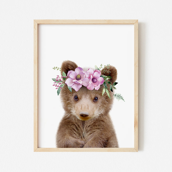 a picture of a teddy bear wearing a flower crown