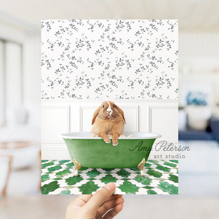 a person holding a card with a picture of a rabbit in a bathtub