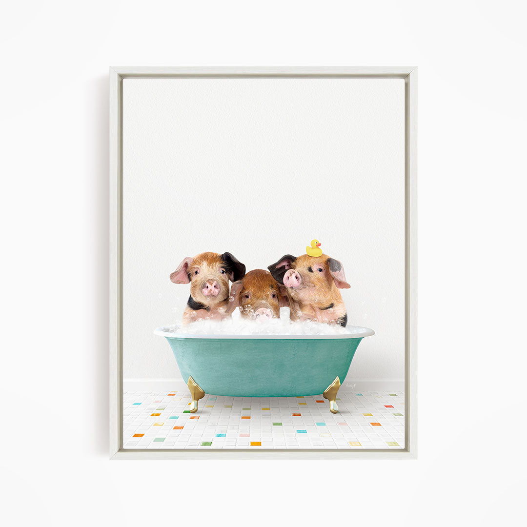 Three adorable pigs sitting in a green bathtub filled with bubbles, with one of them wearing a yellow hat.
