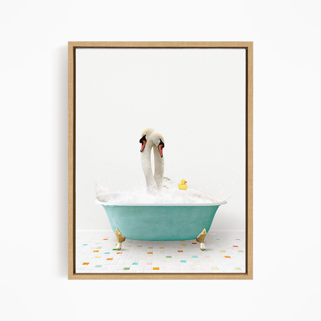 A white swan standing in a blue bathtub filled with bubbles, with a yellow rubber duck floating nearby.