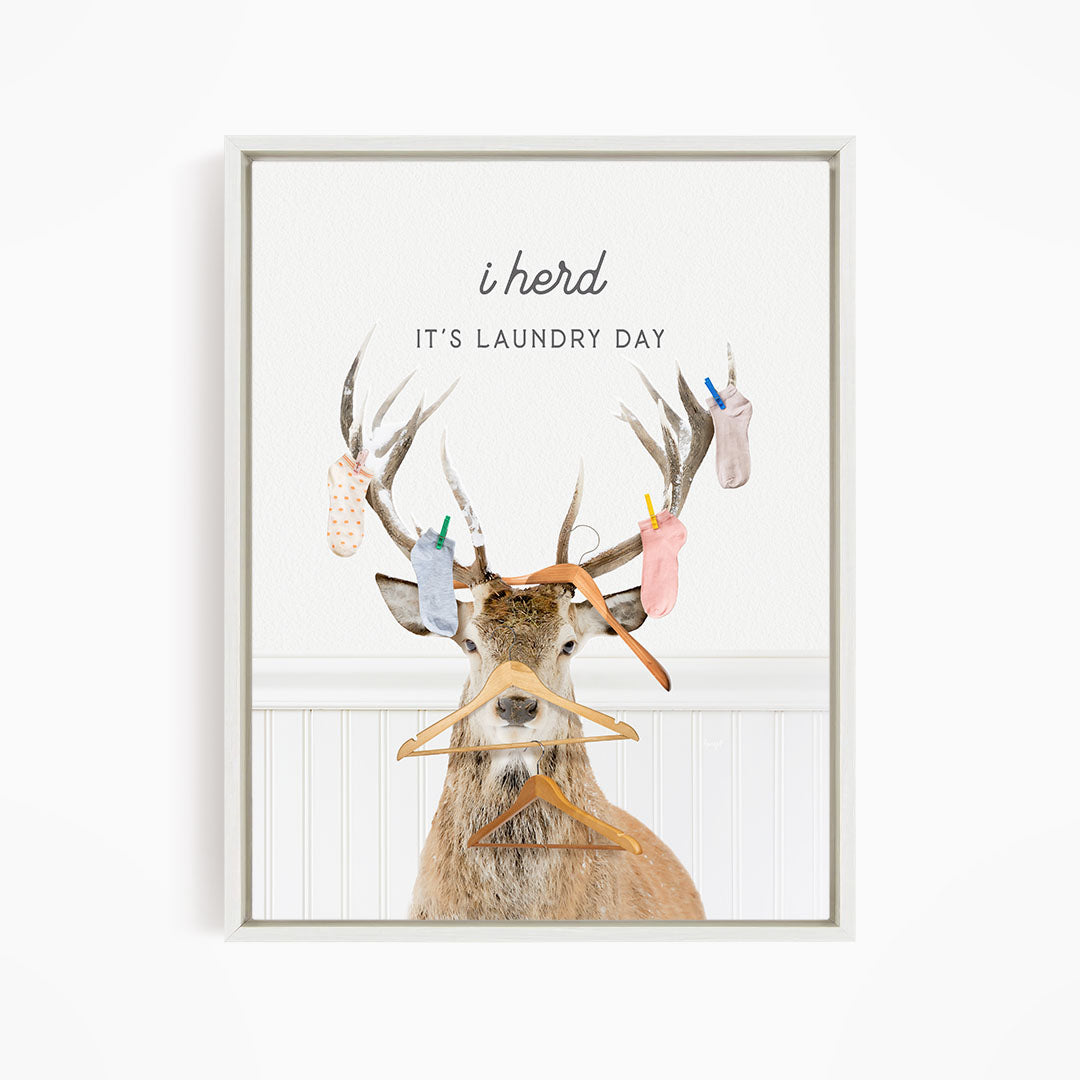 A deer with antlers wearing clothes and socks, with the text "It's laundry day" above it.