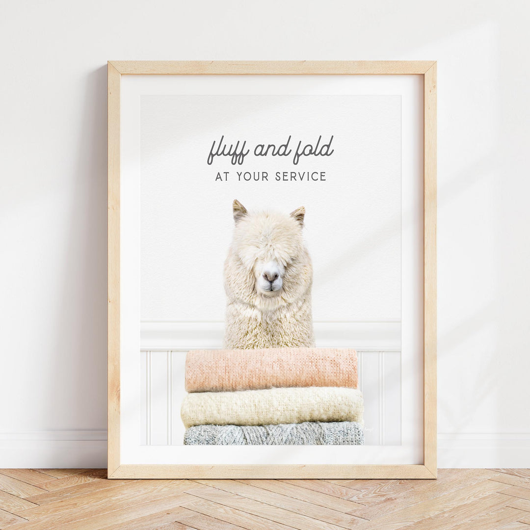 a picture of a polar bear sitting on a pile of towels