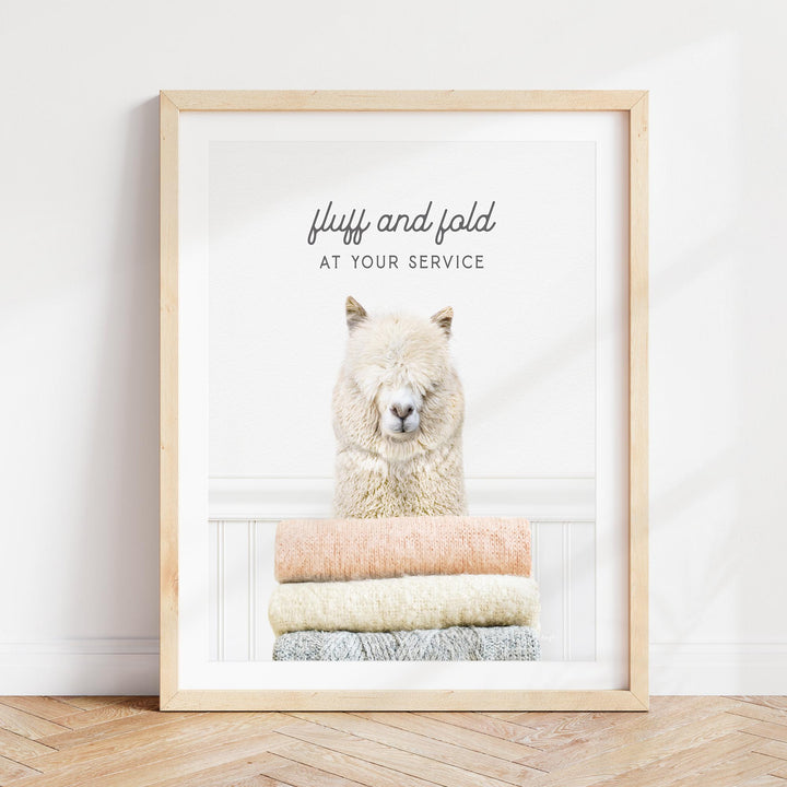 a picture of a polar bear sitting on a pile of towels