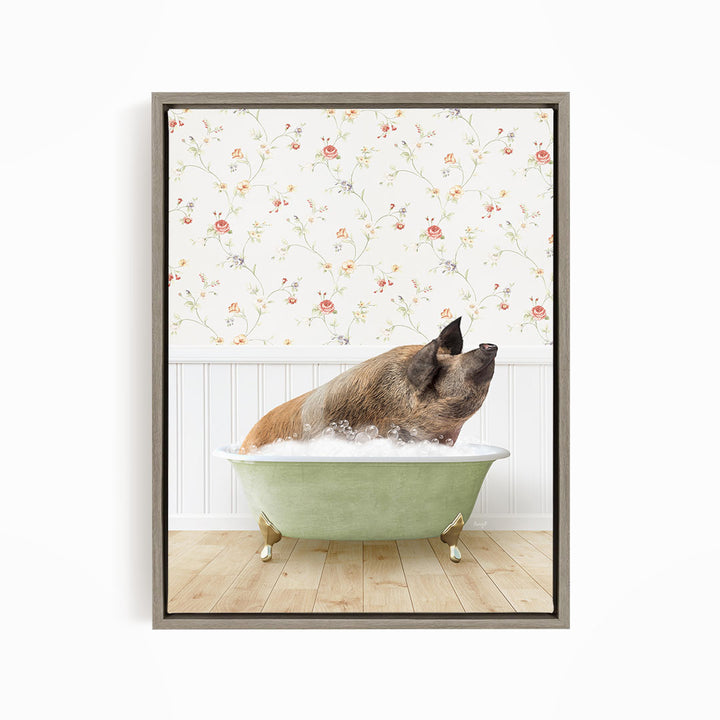 A brown pig sitting in a green bathtub filled with bubbles, with a floral wallpaper in the background.