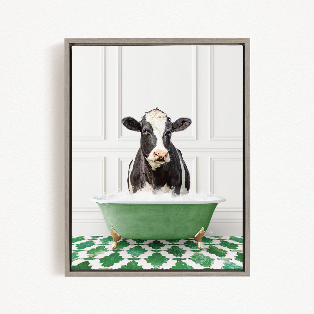 A black and white cow is standing in a green bathtub filled with water, creating a whimsical and humorous scene.