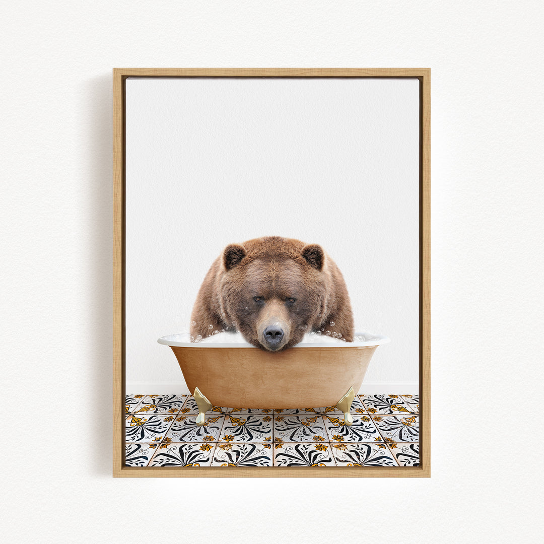 A brown bear is sitting in a bathtub filled with water, appearing to be enjoying the bath.