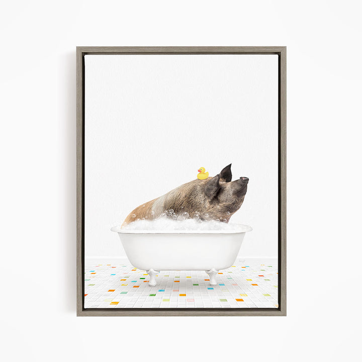 A pig sitting in a white bathtub filled with bubbles, with a rubber duck floating on its back.