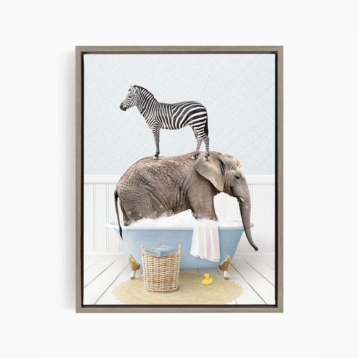 A zebra standing on the back of an elephant, both in a bathtub filled with water and bubbles, with a basket of rubber ducks nearby.