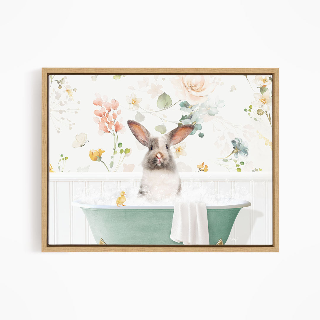 A cute white rabbit sitting in a green bathtub filled with bubbles, surrounded by a floral pattern.