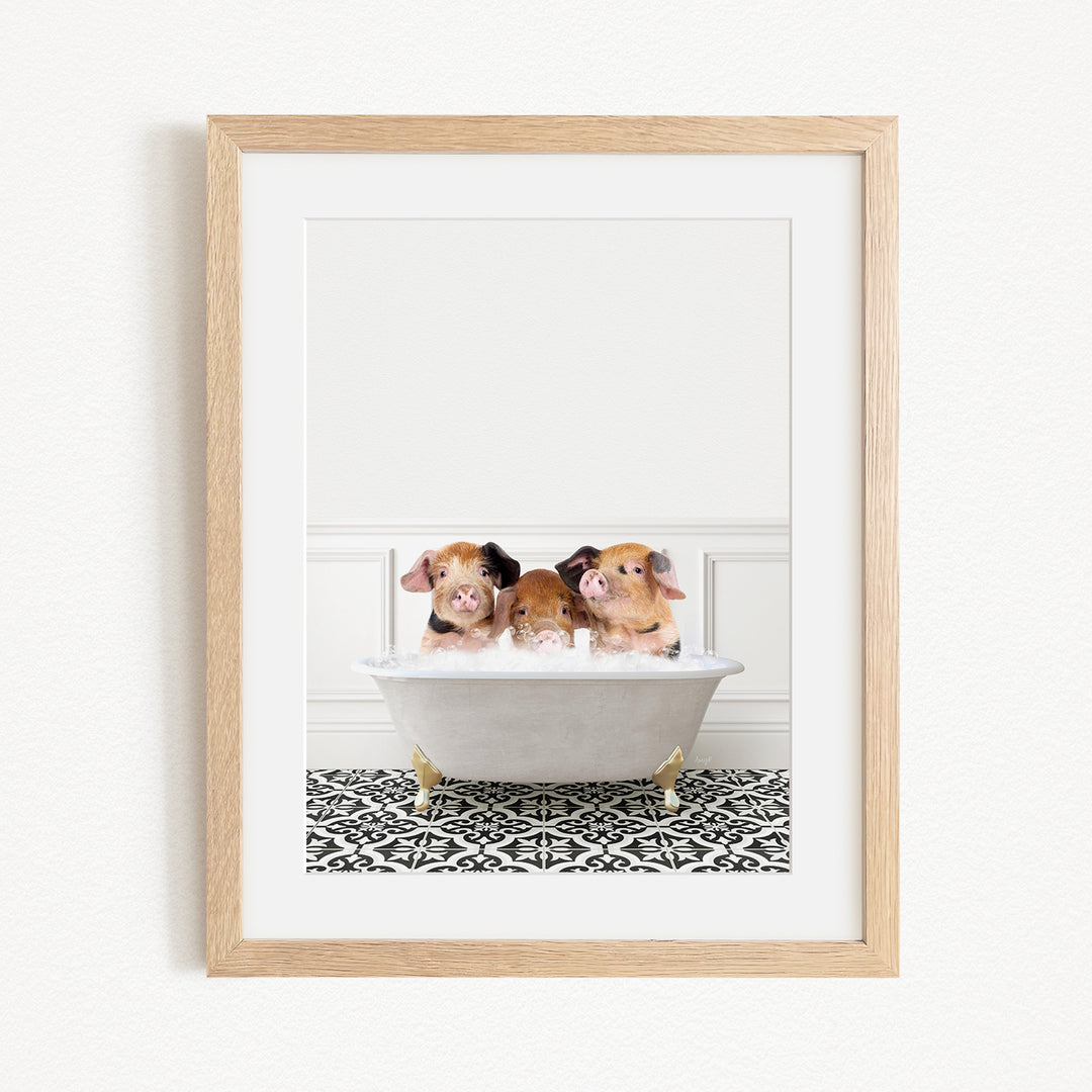 Three adorable pigs sitting in a white bathtub, enjoying a relaxing bath together.