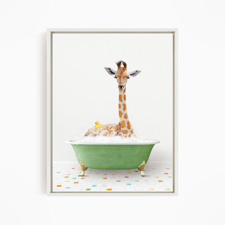 A giraffe is sitting in a green bathtub filled with bubbles, surrounded by a yellow rubber duck.