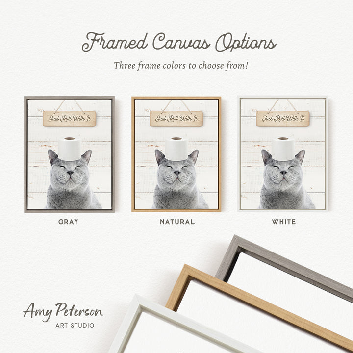 three framed canvas options, each featuring a cat with a sign that reads "Just Roll With It" in different frame colors: gray, natural, and white.