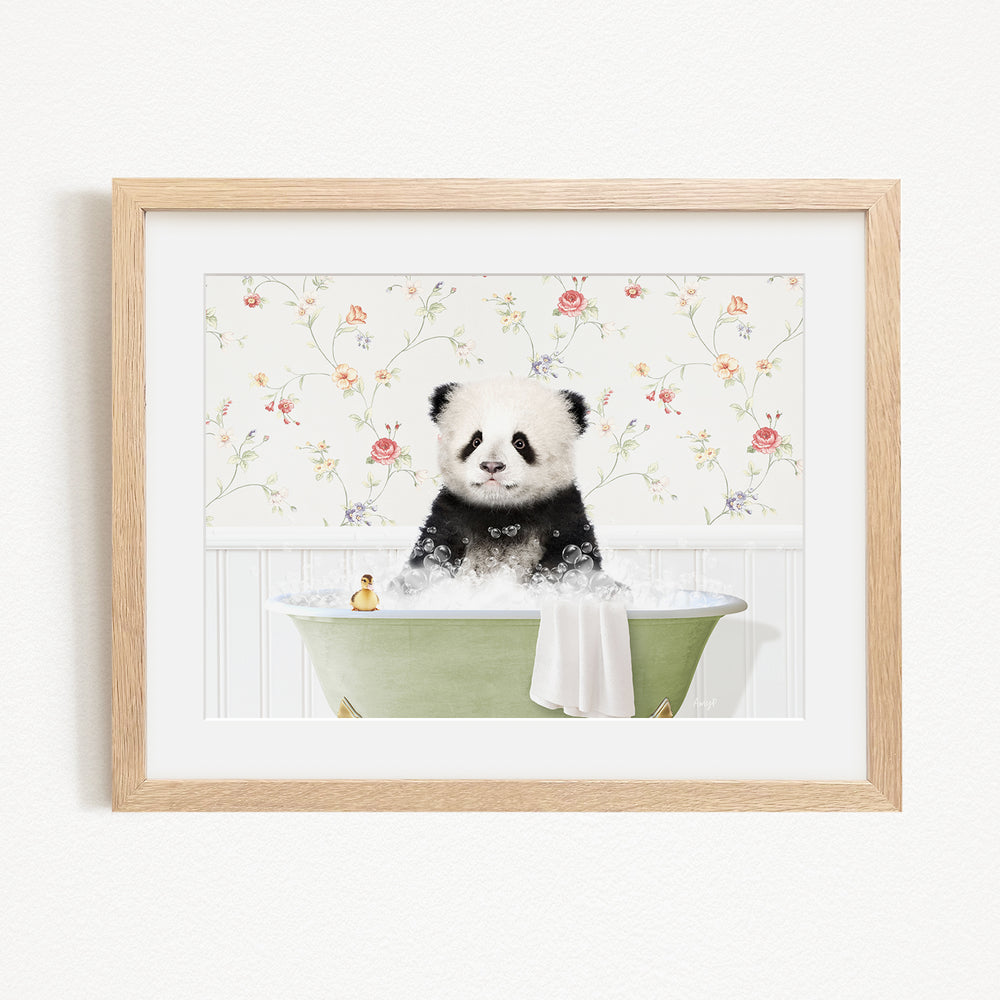A cute panda bear sitting in a green bathtub, surrounded by a floral patterned wall.