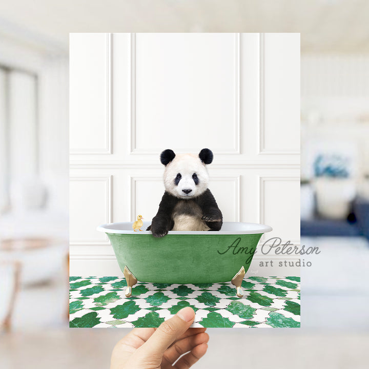 a panda bear sitting in a green bath tub