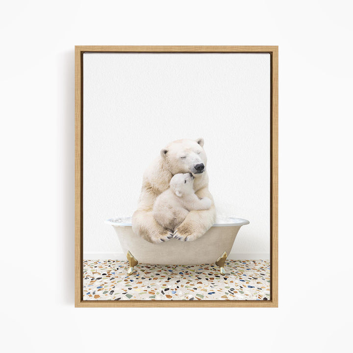 A polar bear and its cub sitting together in a bathtub, with the bear appearing to be hugging the cub.