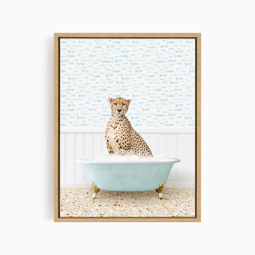 A cheetah sitting in a blue bathtub filled with water, surrounded by a pattern of fish.