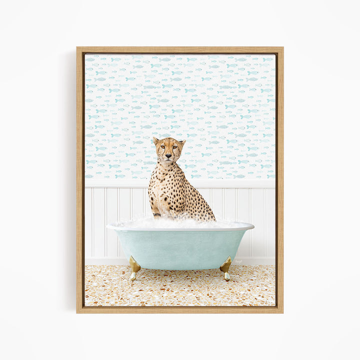 A cheetah sitting in a blue bathtub filled with water, surrounded by a pattern of fish.