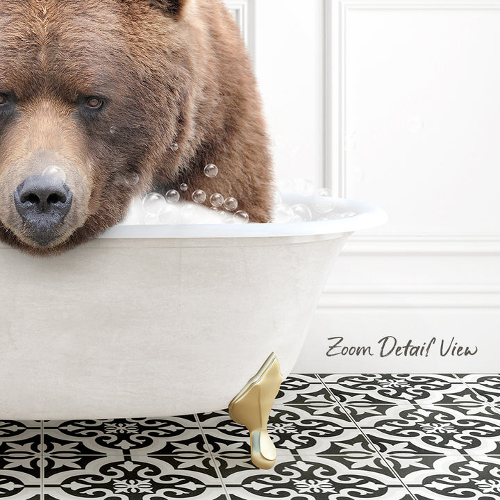 A large brown bear is sitting in a white bathtub filled with bubbles, creating a whimsical and playful scene.