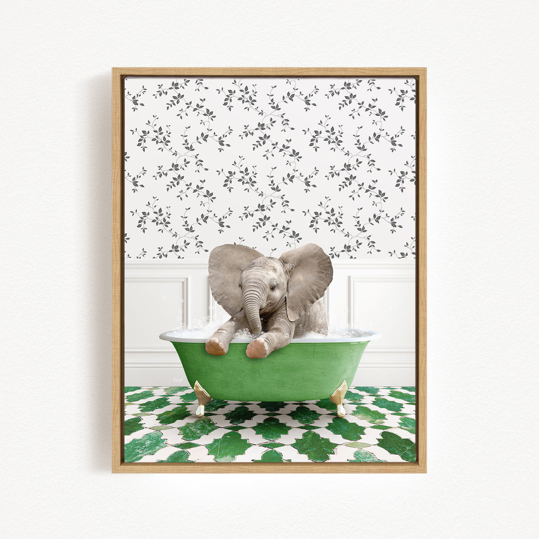 A baby elephant sitting in a green bathtub, surrounded by a patterned wall and green and white tiles.