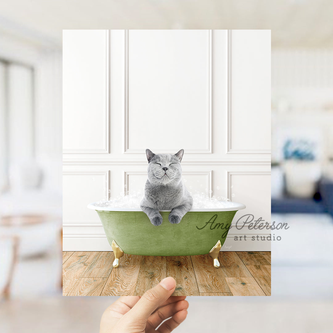 a cat sitting in a green bath tub