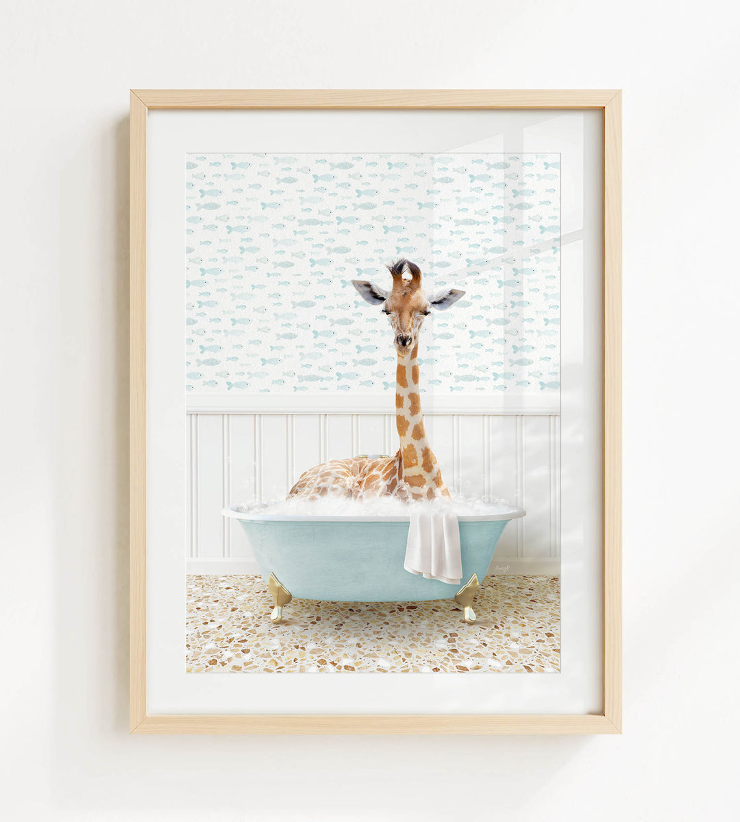 A giraffe is sitting in a blue bathtub filled with bubbles, surrounded by a patterned wall and a white floor.