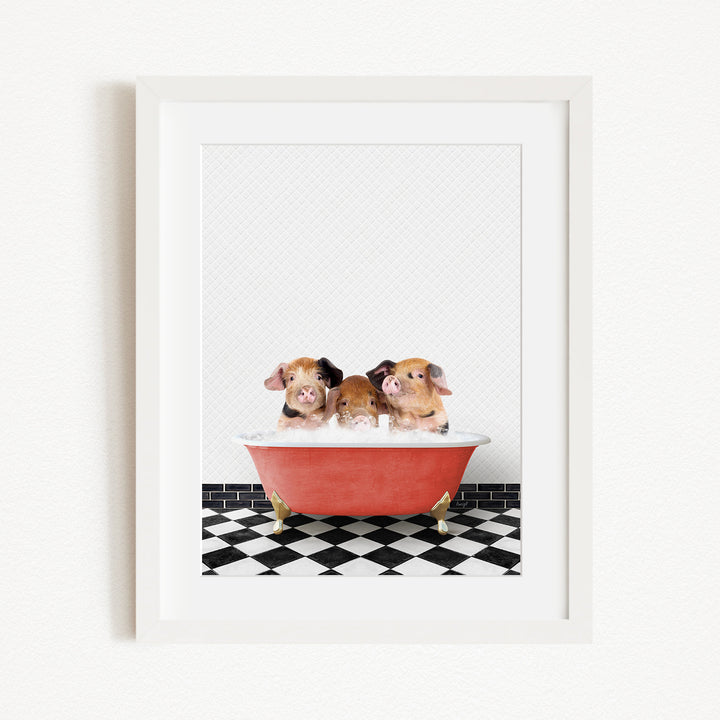Three adorable pigs sitting in a red bathtub, enjoying a relaxing bath together.