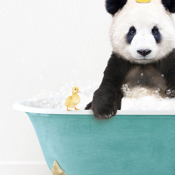 a panda bear sitting in a bathtub with bubbles