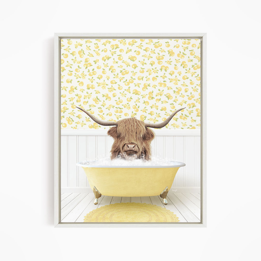 A brown cow with long horns is sitting in a yellow bathtub filled with water, surrounded by a yellow floral wallpaper.