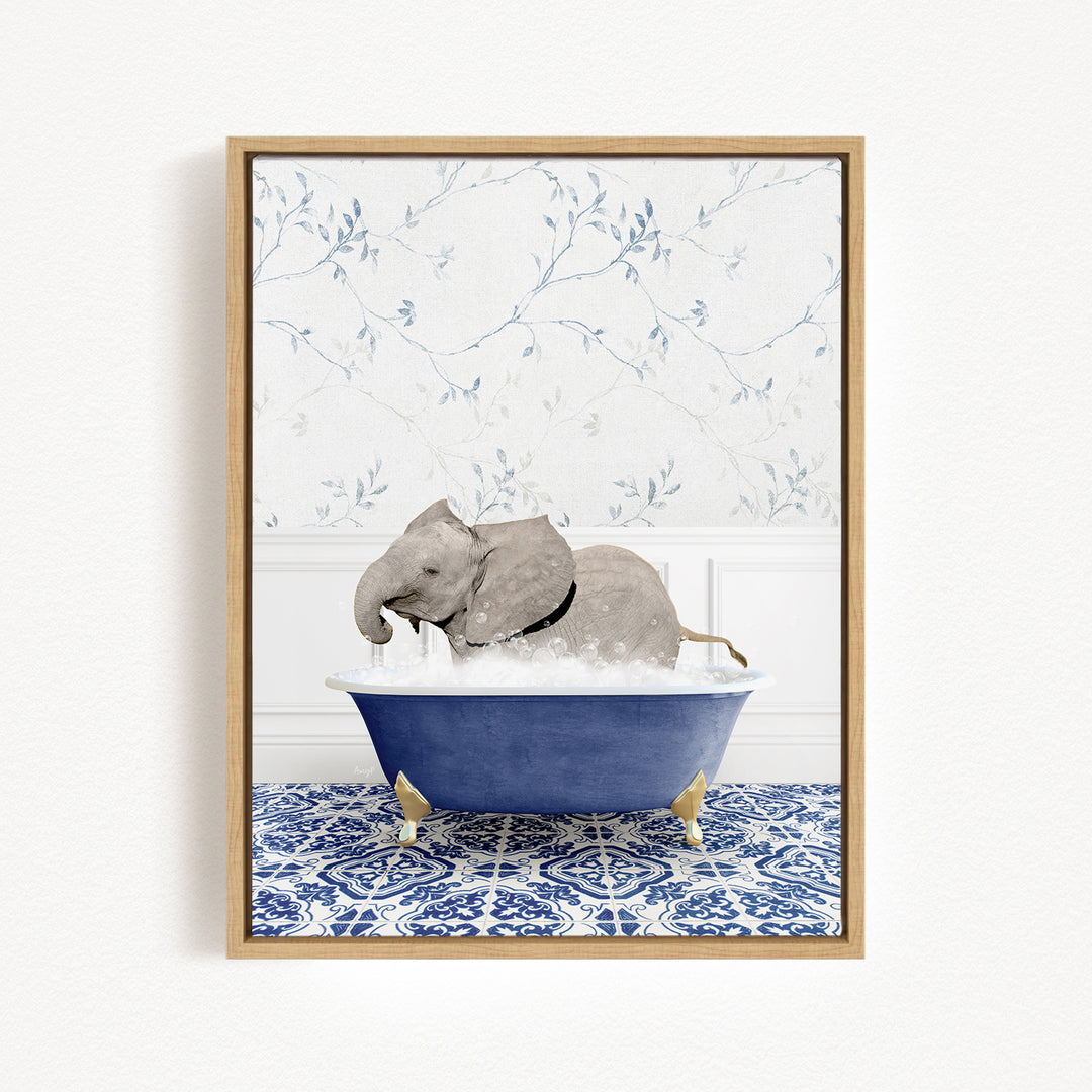 A gray elephant is sitting in a blue bathtub filled with water, surrounded by a blue and white patterned tile floor.