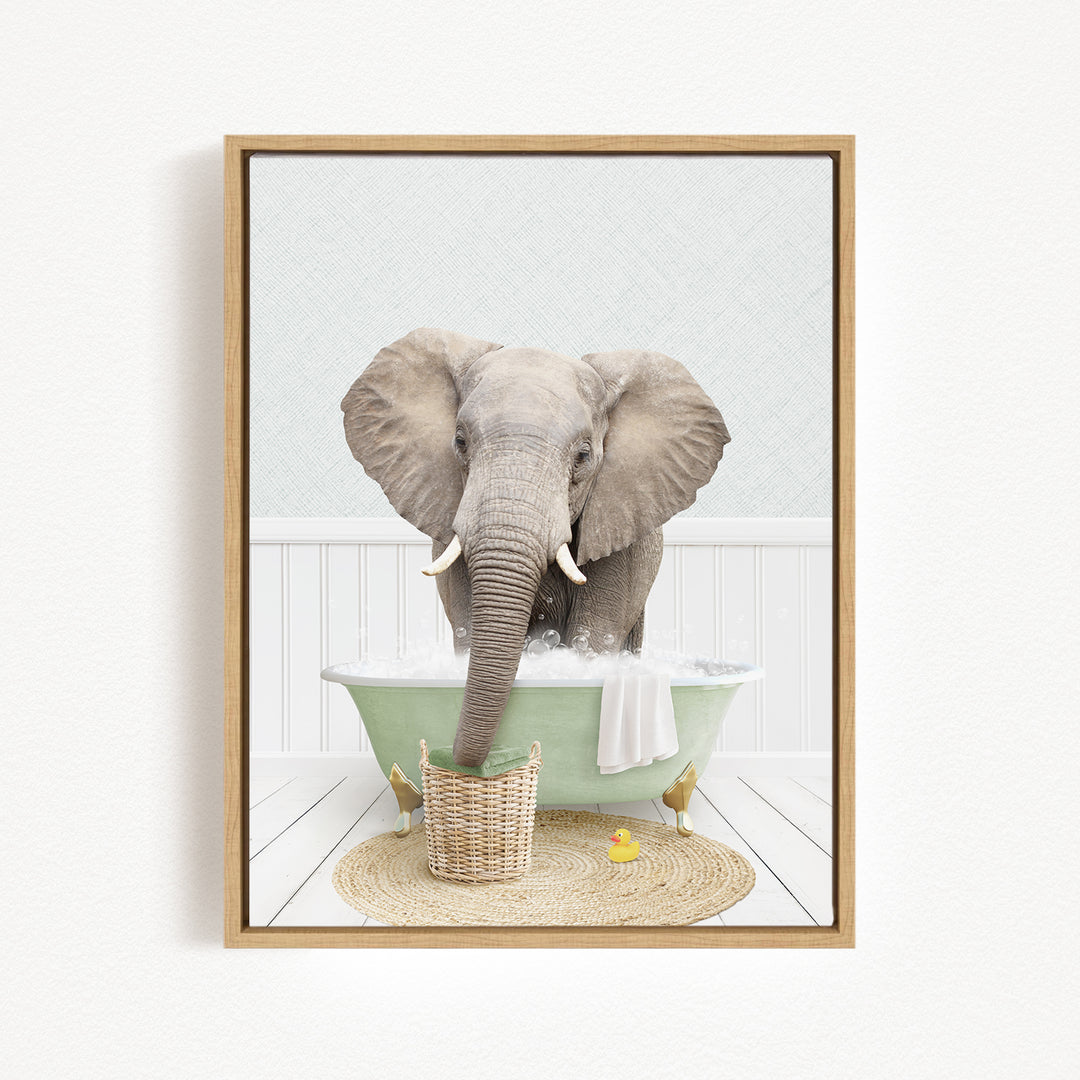 A gray elephant is standing in a green bathtub filled with water, surrounded by a basket of toys and a yellow rubber ducky.