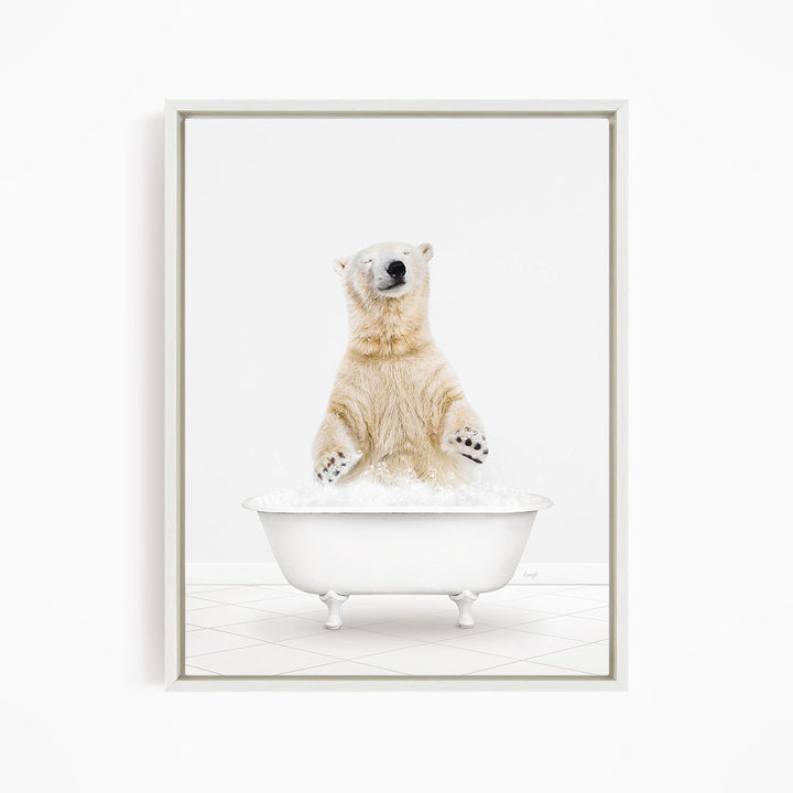 A polar bear standing in a white bathtub filled with water, appearing to be enjoying a bath.