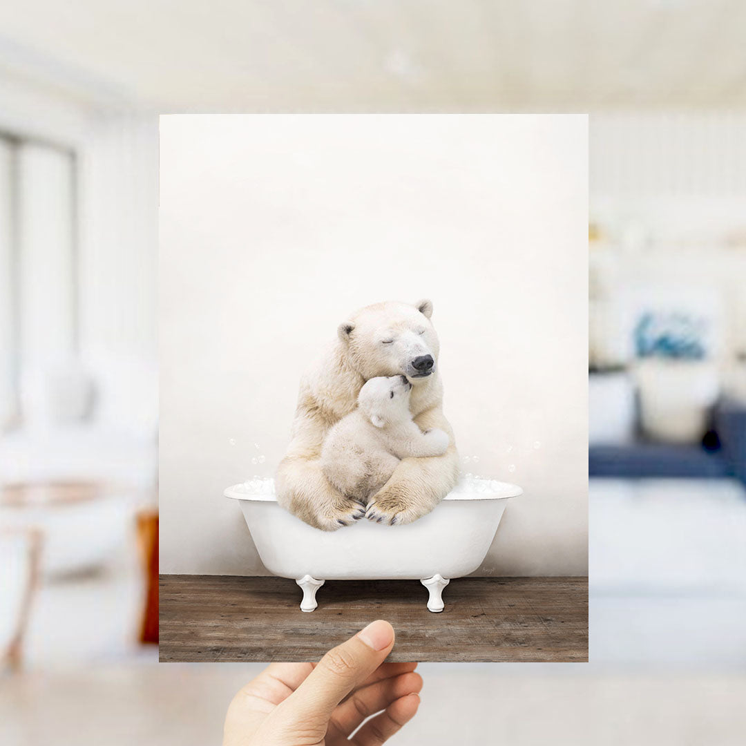 A polar bear and its cub sitting together in a bathtub, with the polar bear appearing to be hugging the cub.