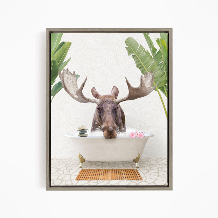 A moose is sitting in a bathtub filled with water, surrounded by tropical plants and flowers.