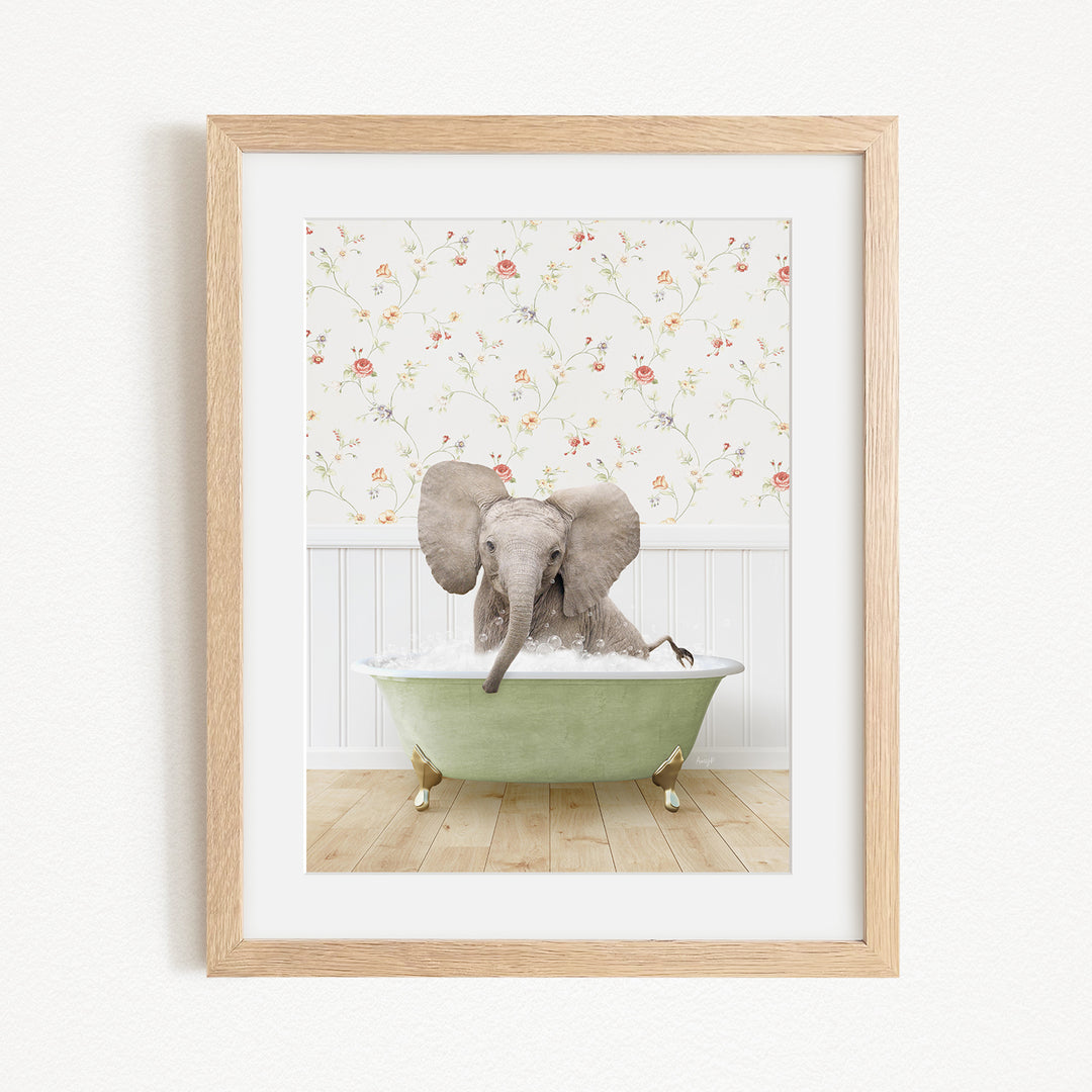 A baby elephant sitting in a green bathtub, surrounded by a floral wallpaper.