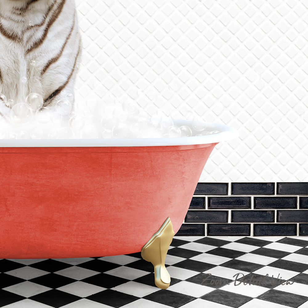 A white cat sitting in a red bathtub filled with bubbles, with a black and white checkered floor and a black and white tiled wall in the background.
