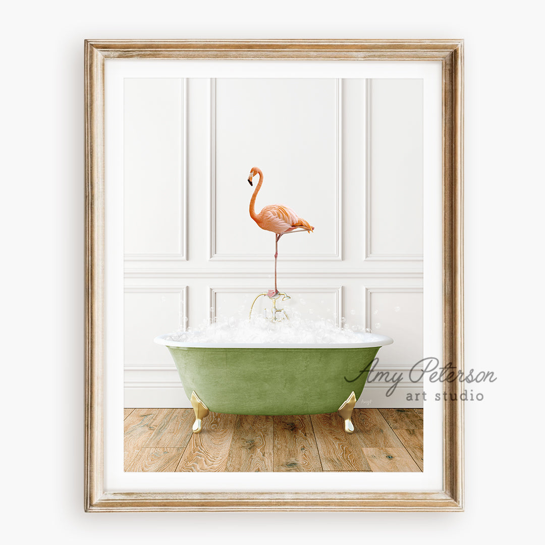 a pink flamingo standing on top of a green bath tub