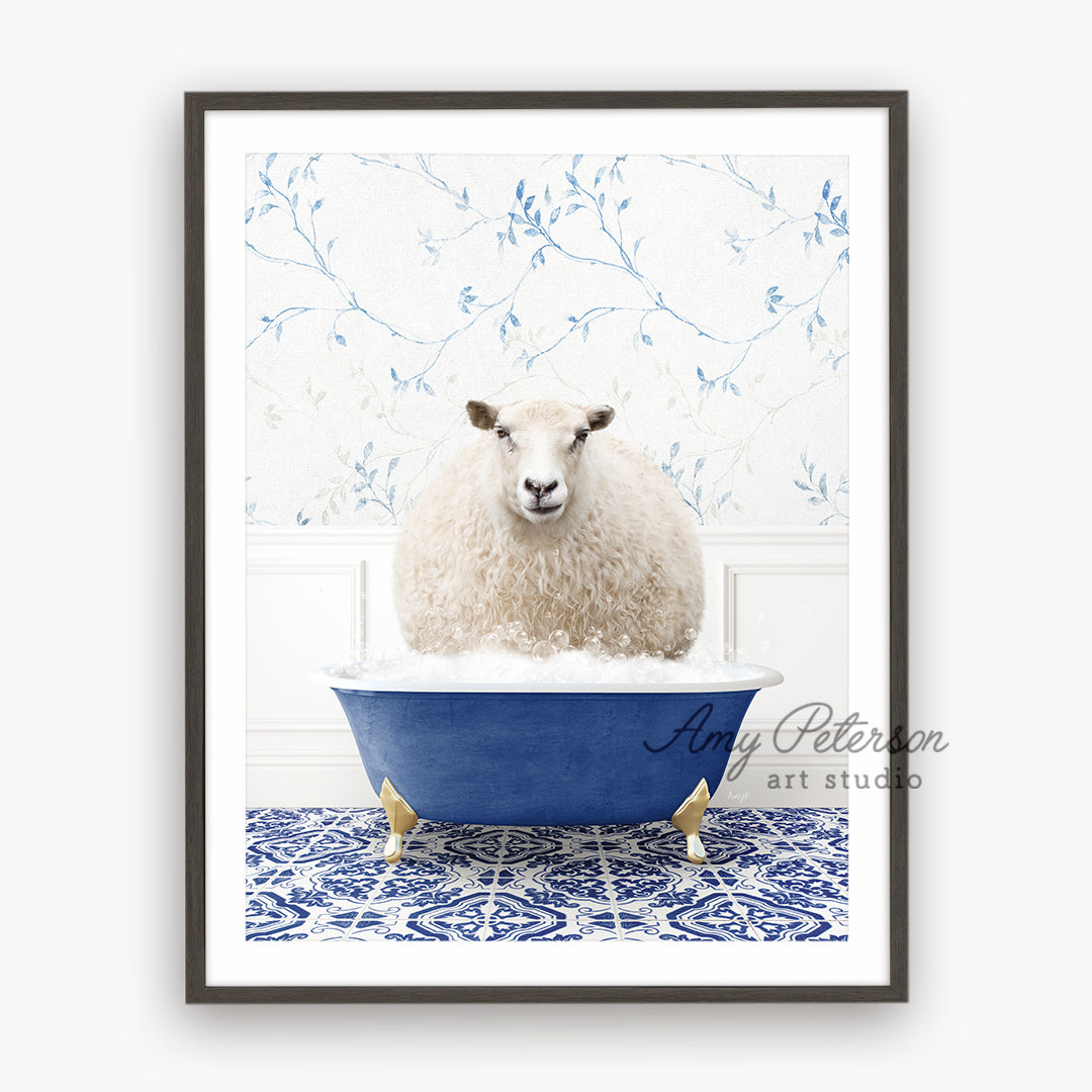 a sheep is sitting in a bathtub with a blue bowl