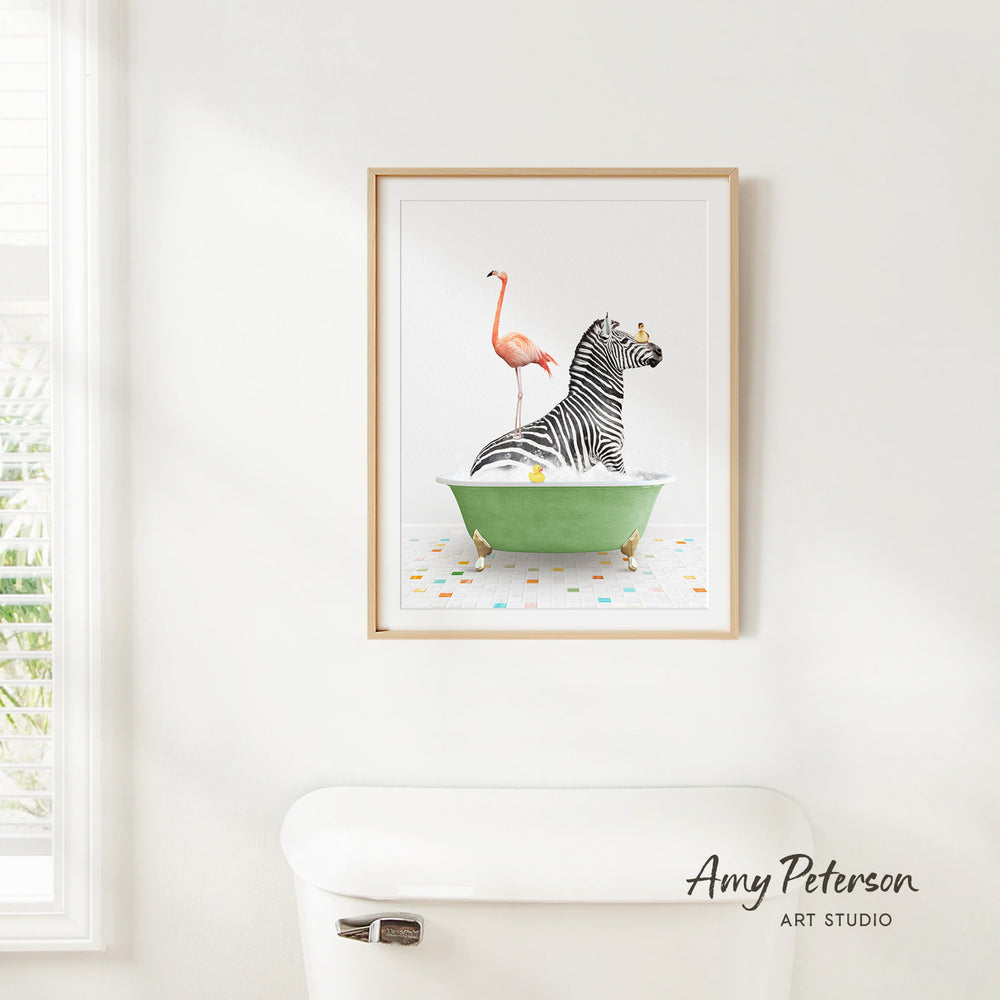 A framed print of a zebra sitting in a green bathtub, with a pink flamingo standing on its back.