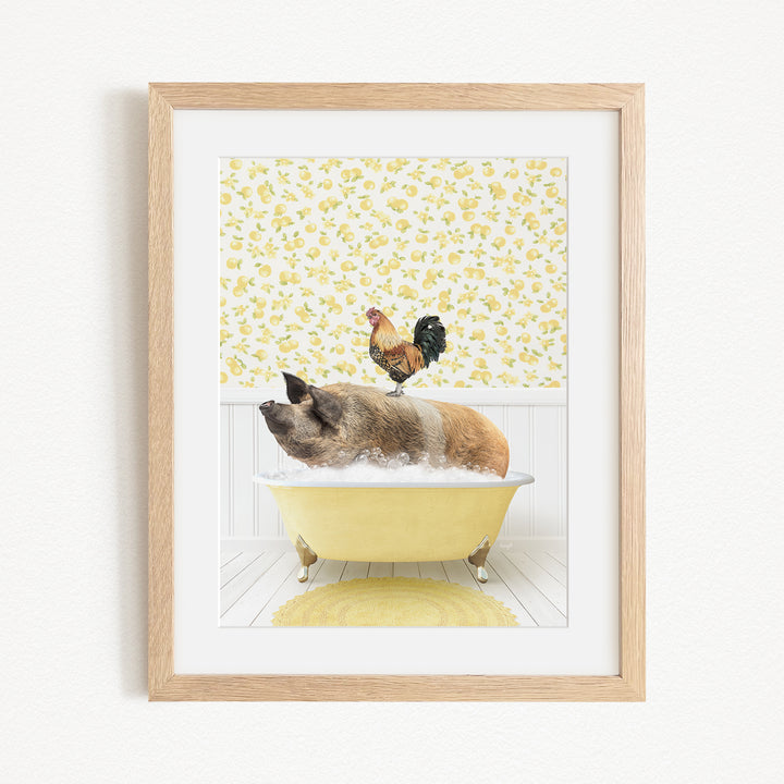 A framed image depicting a pig sitting in a yellow bathtub, with a rooster perched on its head, against a yellow and white floral background.