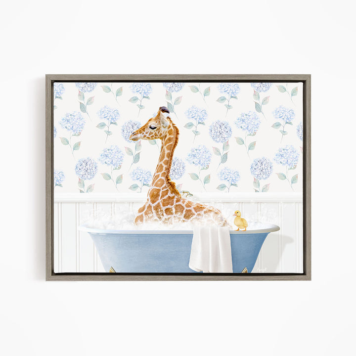 A giraffe sitting in a blue bathtub, surrounded by a floral patterned wall.