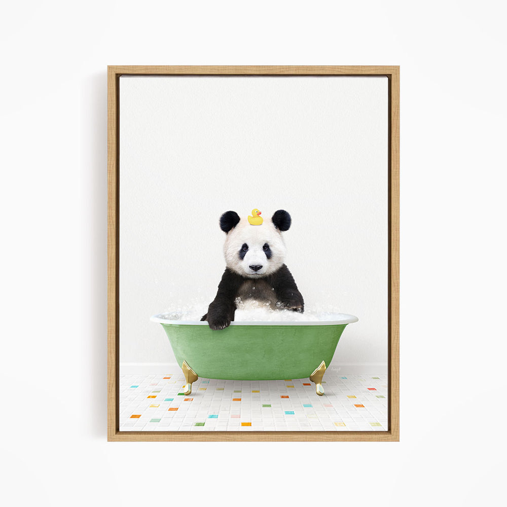 A panda bear sitting in a green bathtub filled with bubbles, with a yellow rubber duck floating on the water.