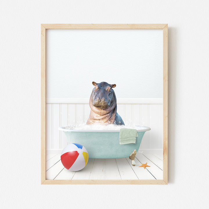 a hippo in a bathtub with a beach ball