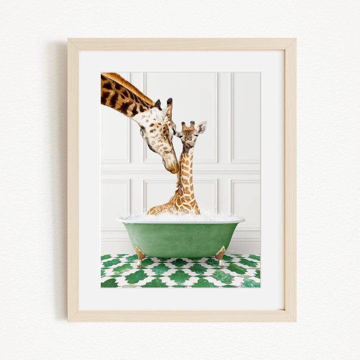 A mother giraffe and her baby giraffe are enjoying a bath together in a green bathtub, with the mother gently licking her baby.
