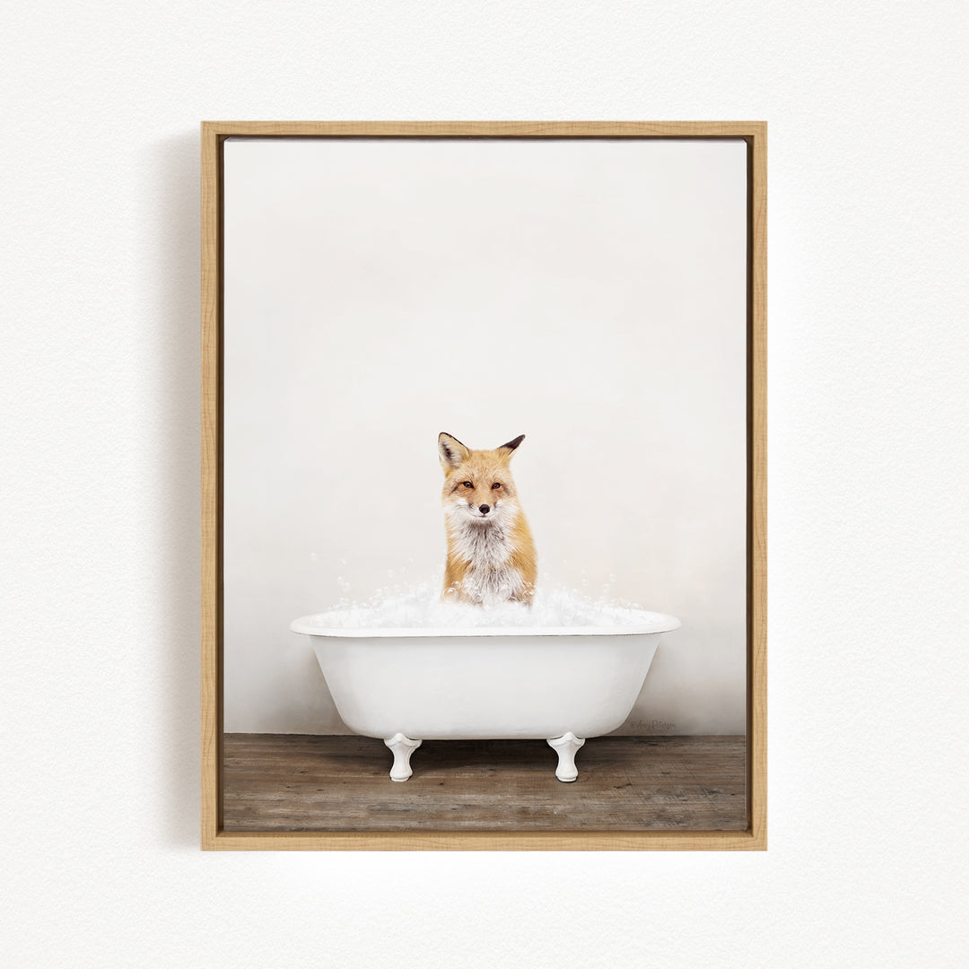 A fox is sitting in a white bathtub filled with water, creating a whimsical and playful scene.