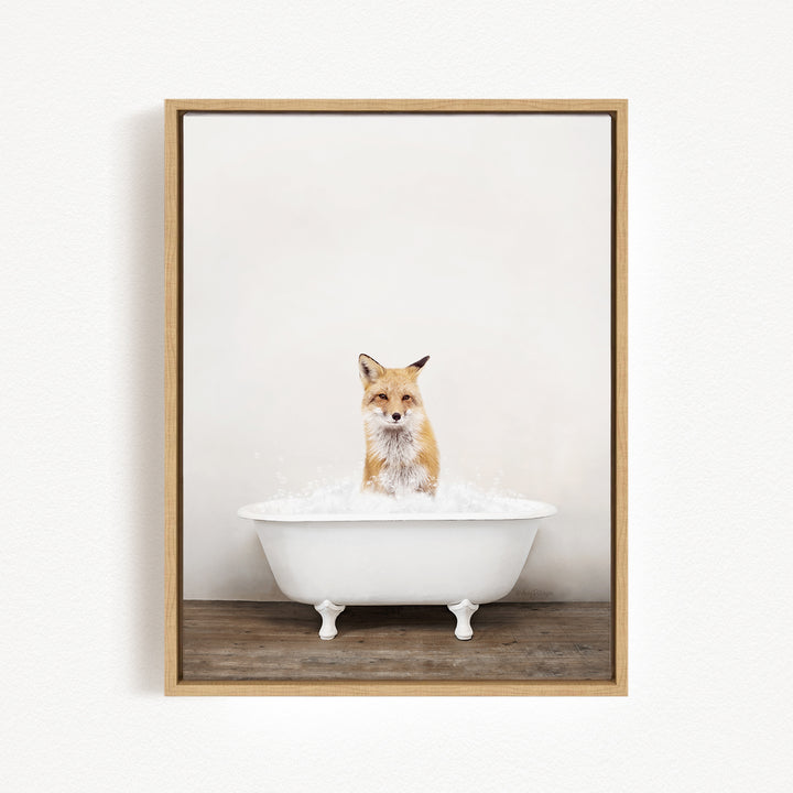 A fox is sitting in a white bathtub filled with water, creating a whimsical and playful scene.