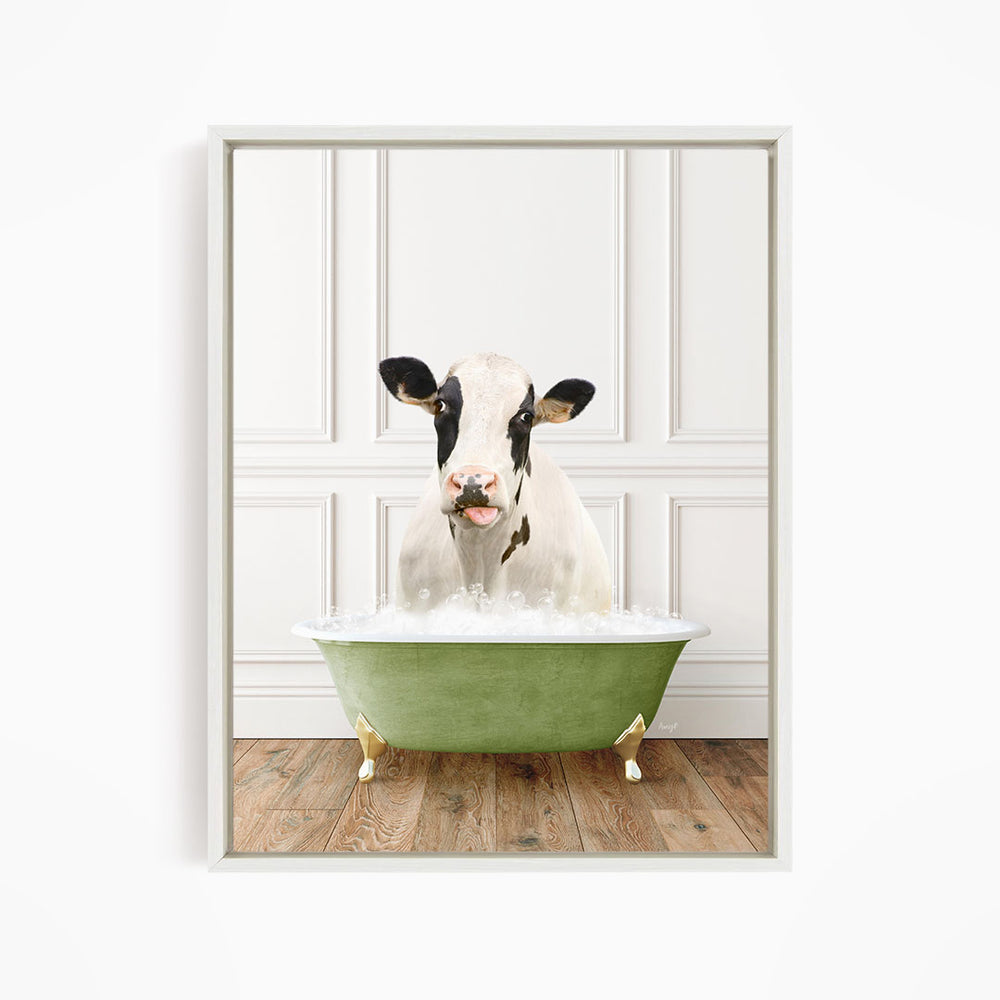 A black and white cow is sitting in a green bathtub filled with water, creating a whimsical and humorous scene.